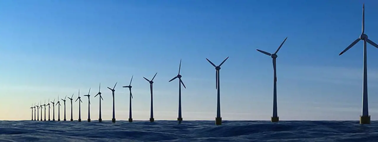 Offshore wind turbines at sunset